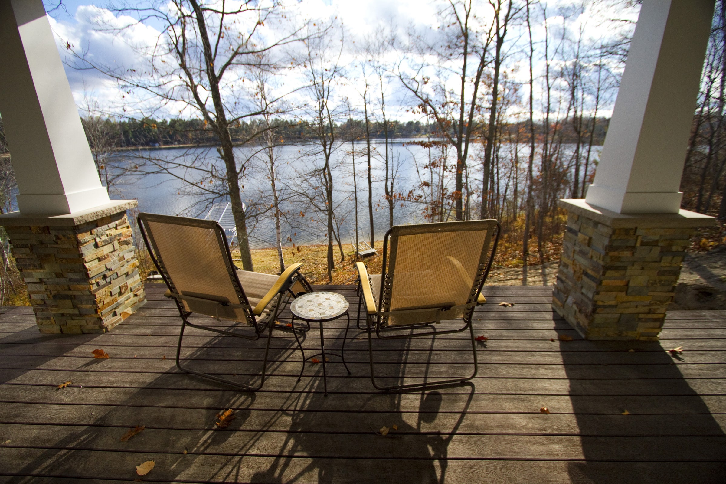 Stacked Stone Installed on Columns in a Lake House in Wisconsin in the Fall